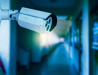 security camera mounted in a hallway